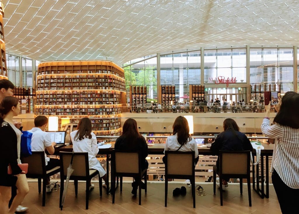 Starfield Library | These Spectacular Libraries in Seoul and Suwon will Blow Your Mind 9 people reading at Starfield Library