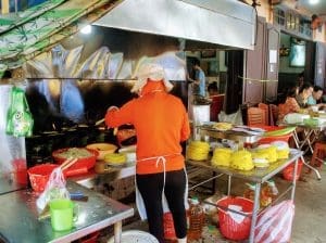 Things to do in Hoi An | How to spend 3 Amazing Days 10 cook making banh xeo at bale well, hoi an