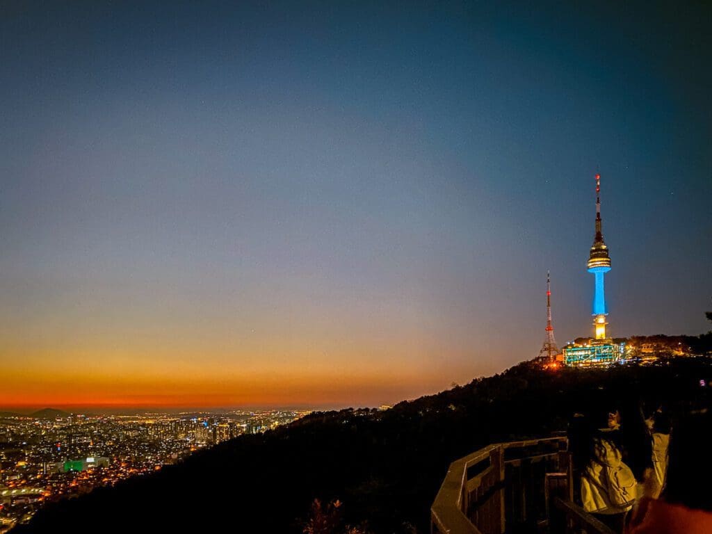 Korea in August 2026 | Weather + Best Festivals (15 Year Local's Guide) 17 namsan tower lit up over seoul at night