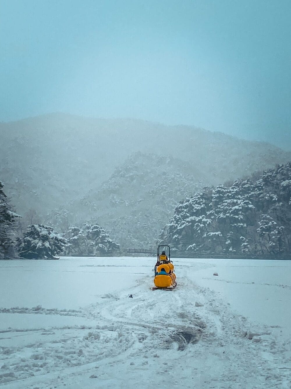 sanjeong lake sledding festival | rubber duck train